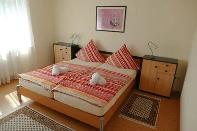 Ein Bett oder Betten in einem Zimmer der Unterkunft Ferienwohnung Kastl