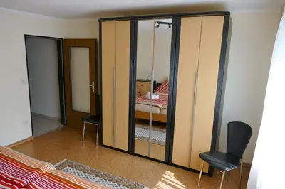 Ein Bett oder Betten in einem Zimmer der Unterkunft Ferienwohnung Kastl