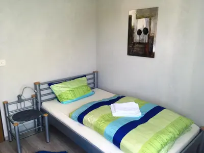 Ein Bett oder Betten in einem Zimmer der Unterkunft Ferienwohnung Kastl