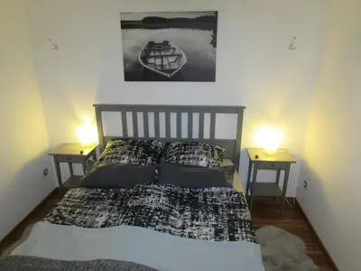 Ein Bett oder Betten in einem Zimmer der Unterkunft Ferienwohnung Fröhlich
