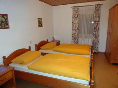 Ein Bett oder Betten in einem Zimmer der Unterkunft Ferienhof Hübner