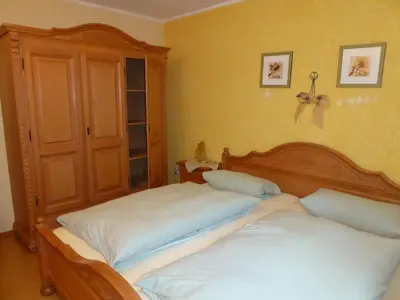 Ein Bett oder Betten in einem Zimmer der Unterkunft Ferienhof Hübner