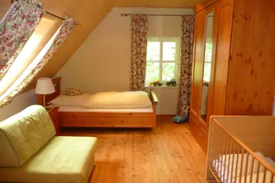 Ein Bett oder Betten in einem Zimmer der Unterkunft Ferienhof Hübner
