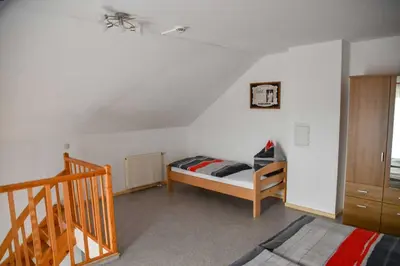 Ein Bett oder Betten in einem Zimmer der Unterkunft Landgasthof Benjamin