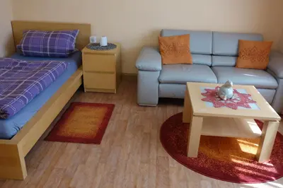 Ein Bett oder Betten in einem Zimmer der Unterkunft Ferienwohnung Arnold