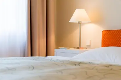Ein Bett oder Betten in einem Zimmer der Unterkunft Villa Sternkopf Suiten Rittersgrün