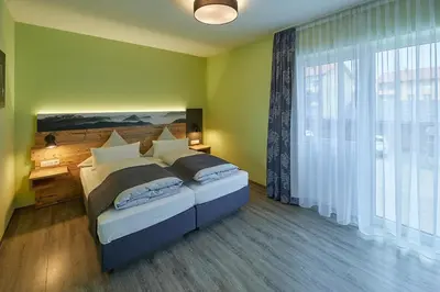 Ein Bett oder Betten in einem Zimmer der Unterkunft Hotel-Gasthof-Fellner