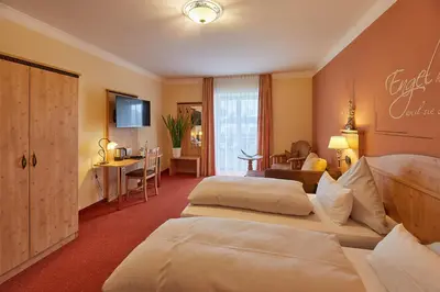 Ein Bett oder Betten in einem Zimmer der Unterkunft Hotel-Gasthof-Fellner