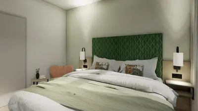 Ein Bett oder Betten in einem Zimmer der Unterkunft Hotel Vogtland