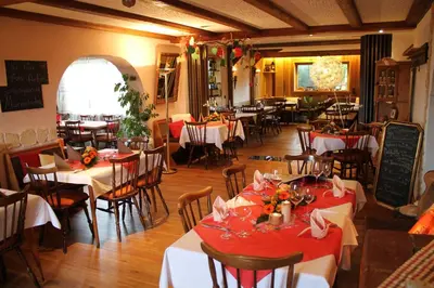 Ein Restaurant oder anderes Speiselokal in der Unterkunft Antjes Schmankerlhotel und Restaurant