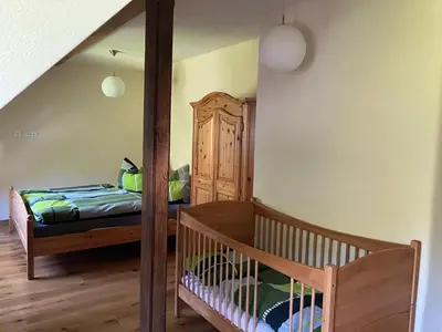 Ein Bett oder Betten in einem Zimmer der Unterkunft Grünlasmühle