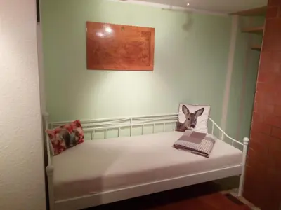 Ein Bett oder Betten in einem Zimmer der Unterkunft Ferienwohnung Körnerberg