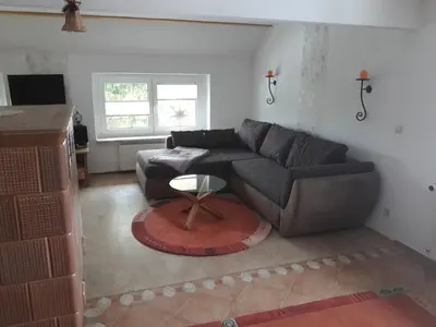 Ein Sitzbereich in der Unterkunft Ferienwohnung Körnerberg