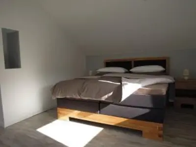 Ein Bett oder Betten in einem Zimmer der Unterkunft Ferienwohnung Bayer