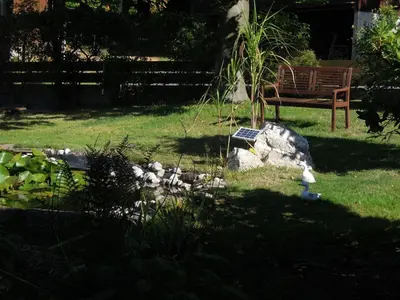 Ein Garten an der Unterkunft Ferienwohnung Bayer