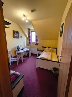 Ein Bett oder Betten in einem Zimmer der Unterkunft Landgasthof Reichsadler