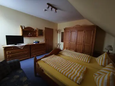 Ein Bett oder Betten in einem Zimmer der Unterkunft Landgasthof Reichsadler