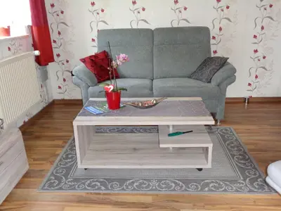 Ein Sitzbereich in der Unterkunft Ferienwohnung Gramalla