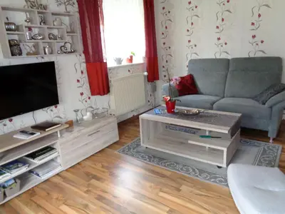 Ein Sitzbereich in der Unterkunft Ferienwohnung Gramalla