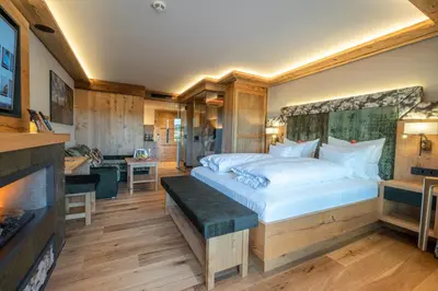 Ein Bett oder Betten in einem Zimmer der Unterkunft Natur- & Wellnesshotel Brunner Hof