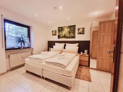 Ein Bett oder Betten in einem Zimmer der Unterkunft Tom's FeWo - Keine Monteure