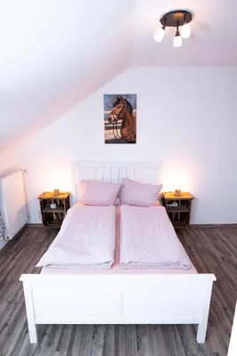 Ein Bett oder Betten in einem Zimmer der Unterkunft Talblickhof