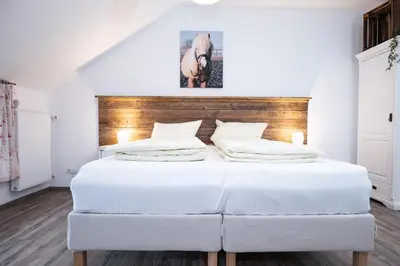 Ein Bett oder Betten in einem Zimmer der Unterkunft Talblickhof