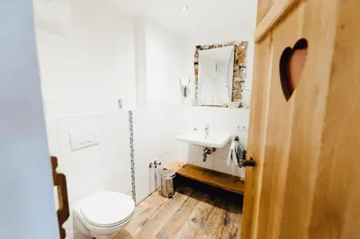 Ein Badezimmer in der Unterkunft Müllner-Hof