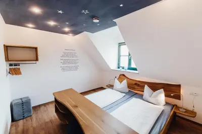 Ein Bett oder Betten in einem Zimmer der Unterkunft Müllner-Hof