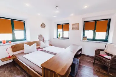 Ein Bett oder Betten in einem Zimmer der Unterkunft Müllner-Hof