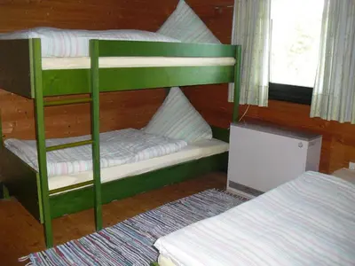 Ein Bett oder Betten in einem Zimmer der Unterkunft Ferienhaus Schallerhof