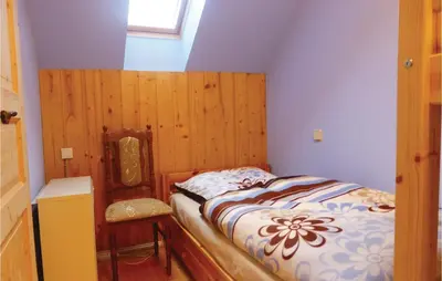 Ein Bett oder Betten in einem Zimmer der Unterkunft Cozy Apartment In Auerbach Ot Grünheide