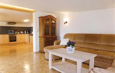 Ein Sitzbereich in der Unterkunft Cozy Apartment In Auerbach Ot Grünheide