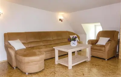 Ein Sitzbereich in der Unterkunft Cozy Apartment In Auerbach Ot Grünheide
