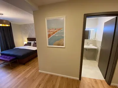 Ein Bett oder Betten in einem Zimmer der Unterkunft Hotel Tortuga & Tex-Mex Bar & Grill