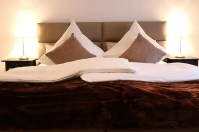 Ein Bett oder Betten in einem Zimmer der Unterkunft Hotel Tortuga & Tex-Mex Bar & Grill
