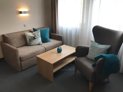 Ein Sitzbereich in der Unterkunft Hotel Kronprinz