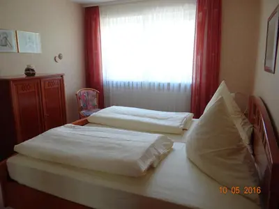 Ein Bett oder Betten in einem Zimmer der Unterkunft Villa Sonnenhof