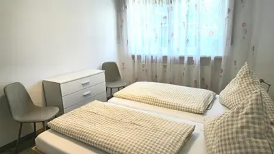 Ein Bett oder Betten in einem Zimmer der Unterkunft Villa Sonnenhof