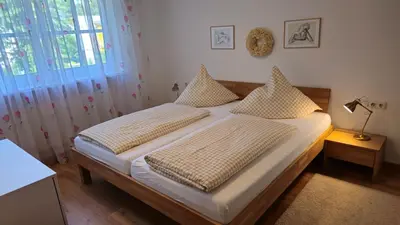 Ein Bett oder Betten in einem Zimmer der Unterkunft Villa Sonnenhof