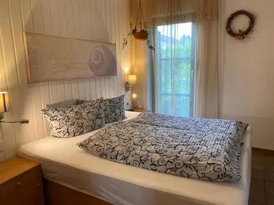 Ein Bett oder Betten in einem Zimmer der Unterkunft Ferienwohnungen Elsterblick Bad Elster