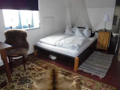 Ein Bett oder Betten in einem Zimmer der Unterkunft Ferienhaus am Geißnhof