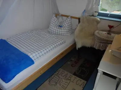 Ein Bett oder Betten in einem Zimmer der Unterkunft Ferienhaus am Geißnhof