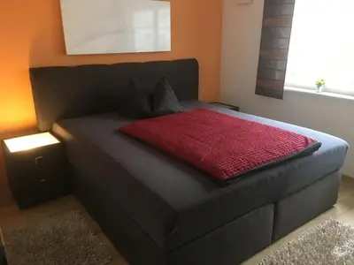 Ein Bett oder Betten in einem Zimmer der Unterkunft Reiger Ferienwohnungen