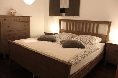 Ein Bett oder Betten in einem Zimmer der Unterkunft Ferienwohnung Familie Becher Klingenthal Aschberg