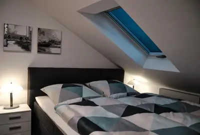 Ein Bett oder Betten in einem Zimmer der Unterkunft Tannenblick-Franken