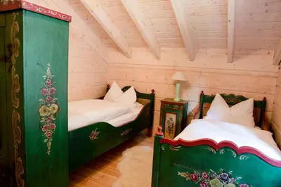 Ein Bett oder Betten in einem Zimmer der Unterkunft Jagdhaus zur Bischofsmühle