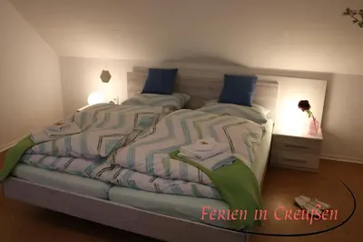 Ein Bett oder Betten in einem Zimmer der Unterkunft Ferien in Creußen