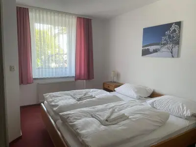 Ein Bett oder Betten in einem Zimmer der Unterkunft Hotel Zum Alten Brauhaus