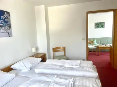 Ein Bett oder Betten in einem Zimmer der Unterkunft Hotel Zum Alten Brauhaus